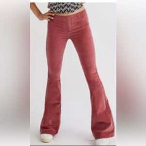 Free People known as the Penny Pull On Corduroy Flare Pants burgundy/wine.
27